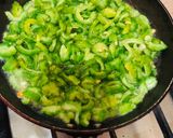 A picture of step 3 of Piyaz Karela.