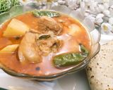 A picture of step 9 of Aloo Chicken Salan.