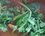 A picture of step 5 of Chicharrón in Red Sauce.
