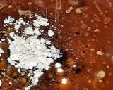 A picture of step 5 of Turai chhilka kofta with curry.