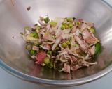 A picture of step 4 of Chinese rolls.