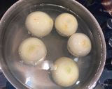 A picture of step 2 of Moghrabieh - semolina dough with chicken.