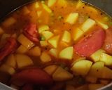 A picture of step 3 of Aloo tamatar tangy curry.