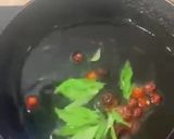 A picture of step 12 of Sweet and sour Tomato Curry serve with white rice.