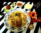 A picture of step 13 of Delhi's layered chicken Dum Biryani.