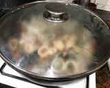 Foto del paso 4 de la receta: Arroz con cuerpos de centollo o cangrejo, cigalas, almejas y calamar