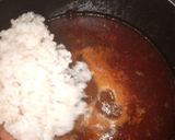 A picture of step 4 of Palm oil rice native jollof rice.