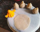 A picture of step 3 of Baked Modak filled with fresh coconut, jaggery, poppy seeds and nutmeg (made in Air fryer).