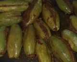 A picture of step 7 of Parwar aur baigan ki kaluji.