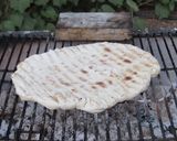 Foto del passaggio 7 della ricetta Pizza cotta sul barbecue