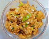 A picture of step 4 of Gobhi with raw turmeric.
