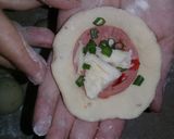 A picture of step 8 of Pizza Buns.