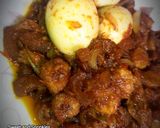 A picture of step 6 of Plantain and kpomo sauce.