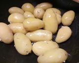 A picture of step 2 of Garlic and parsley butter sautèed new potatoes 🎄.