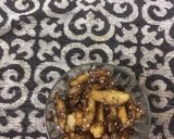 A picture of step 4 of Aloo with sesame seed and honey.