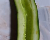 A picture of step 3 of Sweet corn chat in cucumber boat.