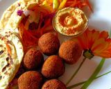 A picture of step 6 of Pita bread with falafel hummus sandwich.