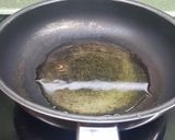 Foto del paso 2 de la receta Pimientos rellenos de bacalao con salsa de tomate y pimientos