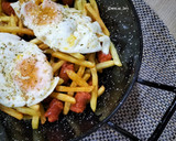 Foto del paso 5 de la receta: Cazuela de patatas y huevos fritos con chistorra