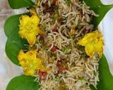 A picture of step 7 of Pumpkin Flowers Fried Rice.