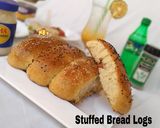 A picture of step 11 of Stuffed Bread Logs.