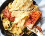 A picture of step 9 of Chicken fettuccine pasta in white sauce.
