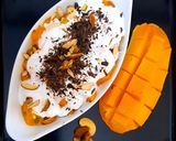 A picture of step 6 of Creamy Mangoes with nuts🥭🥭🥭🥭🥭.