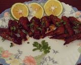 A picture of step 9 of Sticky orange wings.
