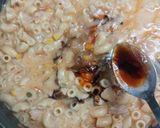 A picture of step 6 of Peri peri chicken macaroni.