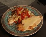 Foto del paso 5 de la receta: Pechuguita de pollo con arroz, cebolla y morrón