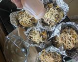A picture of step 5 of Jacket Potato with sausage mix.