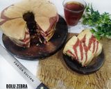 Foto langkah ke 5 dari resep Bolu Zebra Merah Putih Lembut all in one.