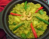 A picture of step 6 of Thor Muri Ghonto (Banana Stem cooked with Rice).
