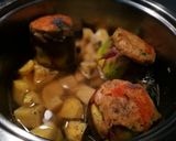 Foto del passaggio 7 della ricetta Carciofi ripieni