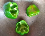 A picture of step 4 of Tandoori stuffed bell pepper.