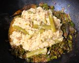 A picture of step 7 of Pui Shake Diye Bhaja Muger Dal (Roasted Moong Dal Cooked With Malabar Spinach - Bong Style).