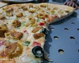 A picture of step 5 of Tikka n kabab pizza.