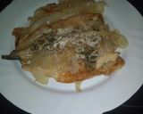Foto del paso 7 de la receta Dorada al horno con cebolla y pimientos