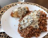 A picture of step 7 of Chicken breast stuffed with mushrooms poured mushroom sauce.