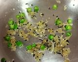 A picture of step 2 of Aloo Potoler Khosar(peels) chorchori.