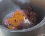 A picture of step 1 of Dum ka qeema.