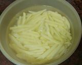 Foto del paso 12 de la receta: Palomitas de cerdo adobado en salsa de almendras y papas fritas