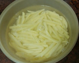 Foto del paso 12 de la receta: Palomitas de cerdo adobado en salsa de almendras y papas fritas