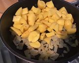 Une image de l'étape 5 de Pommes de terre à la tomate, coriandre et épices.