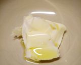 A picture of step 1 of New potatoes with a garlic and herb butter.