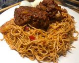 A picture of step 8 of Jollof spaghetti (restaurant version).