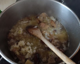 Foto del paso 3 de la receta: Confit de muslo de pato con setas, crujiente de almendra y arroz