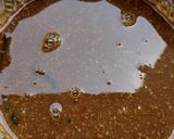 A picture of step 14 of Authentic Kollu Rasam with Rice.