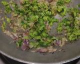 A picture of step 4 of Chilli paneer stuffed spinach wrap.