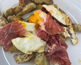 A picture of step 6 of Fried Artichokes with Eggs and Iberian Ham.